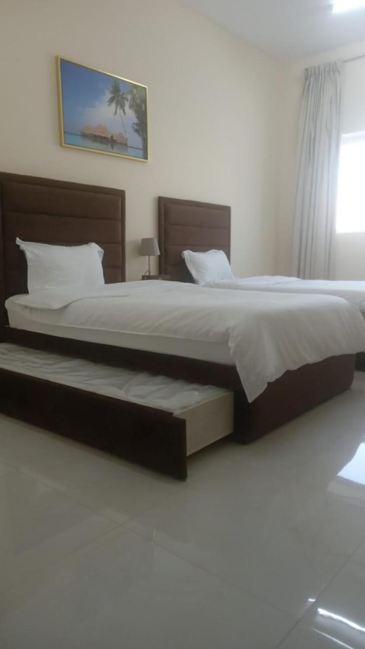 Al Rawda Apartments -Adschman Exterior foto